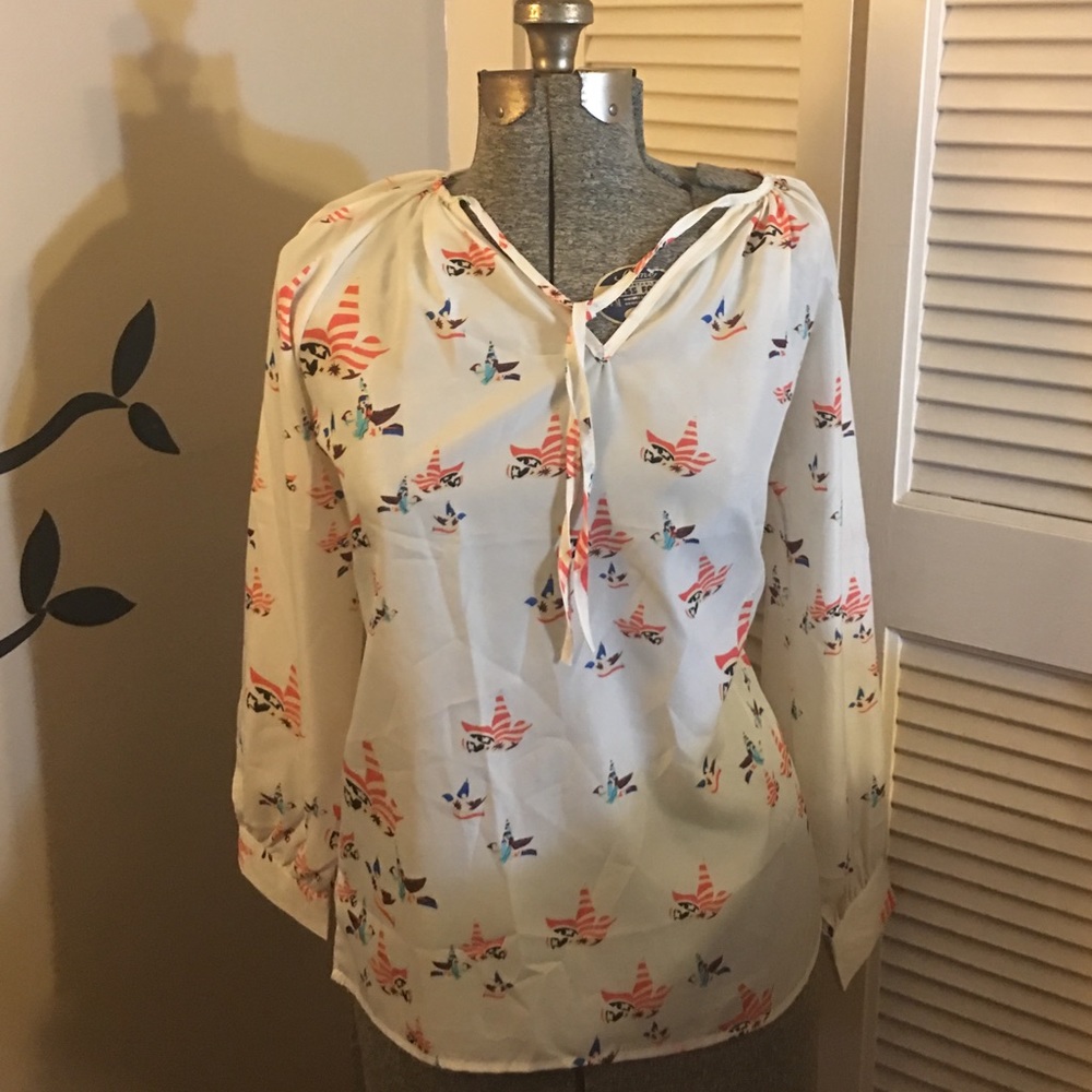 Singwing blouse (fits a junior size large)